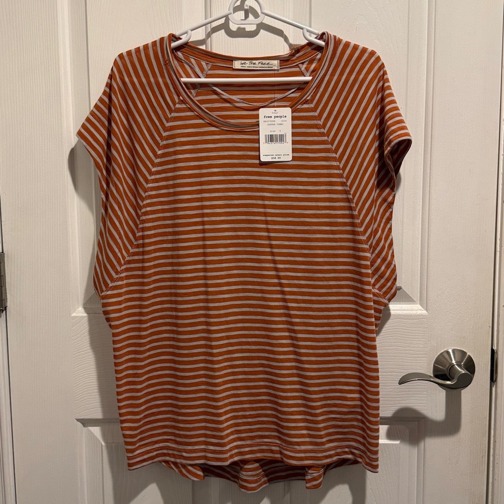 Free people brand orange and tan striped oversized top